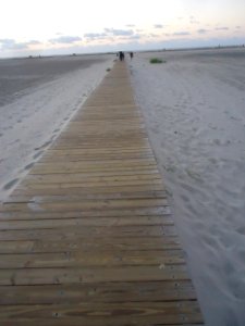 Walkway from boardwalk to shoreline at Wildwood New Jersey photo