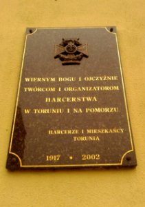 Tablica na kamienicy pod adresem Rynek Nowomiejski 6 w Toruniu