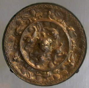 Tang dynasty bronze mirror with lions and grapevines design, HAA