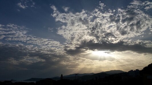 Clouds sea ray photo