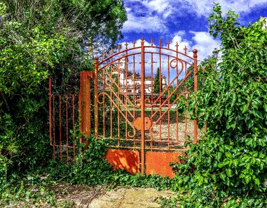 Wrought iron orange color wood photo