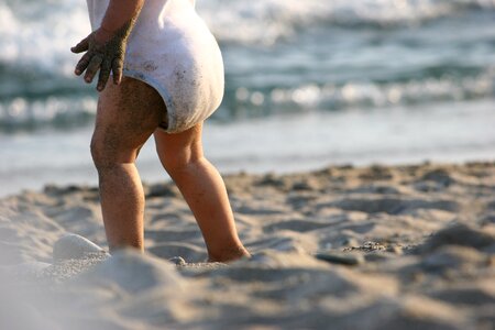Sandy child gray beach