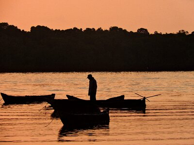 Fisherman seashore morning photo