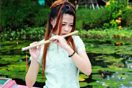 Girl vietnames flute costume photo
