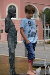 Posing statue figure