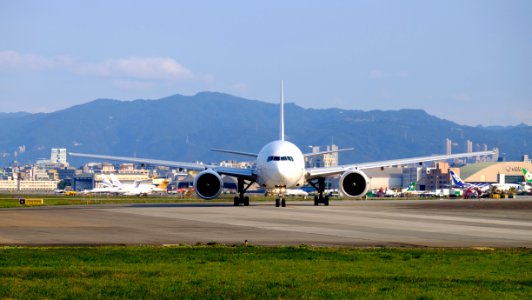 Japan Airlines Boeing 777-246ER JA705J Departing from Taipei Songshan Airport 20150103b
