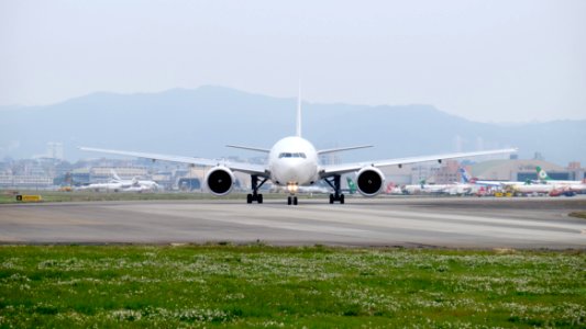 Japan Airlines Boeing 777-246ER JA707J Departing from Taipei Songshan Airport 20150221b