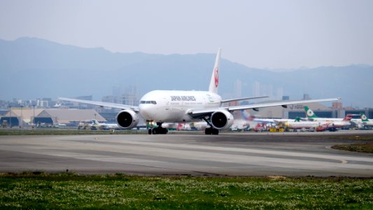 Japan Airlines Boeing 777-246ER JA707J Departing from Taipei Songshan Airport 20150221a