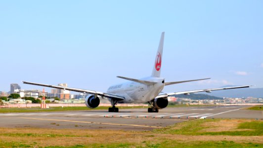 Japan Airlines Boeing 777-246ER JA705J Departing from Taipei Songshan Airport 20150103e