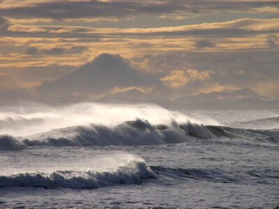 Mountains wave sunset
