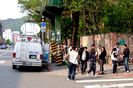 News Reporters and ETTV News SNG Van at Section 1, Huanshan Road, Neihu District, Taipei 20160330 photo
