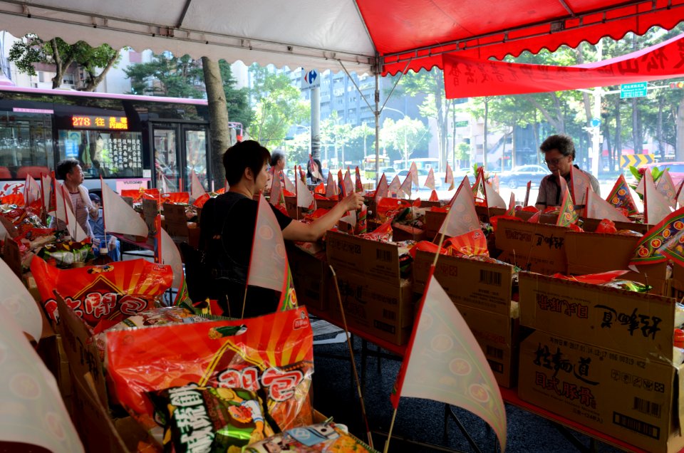 Neighbors Insert Joss Sticks on Offering Items 20160814