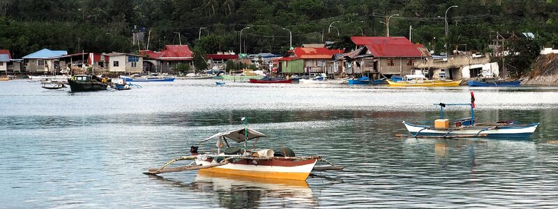 Stilt houses water sea photo