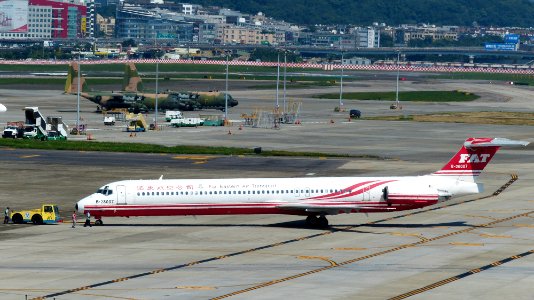 Far Eastern Air Transport MD-83 B-28007 Backup and Turning by Tractor at Taipei Songshan Airport 20160924