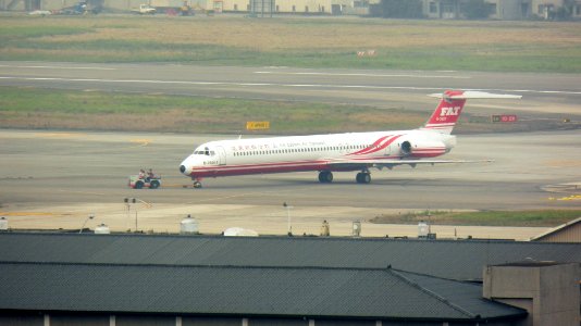 Far Eastern Air Transport MD-83 B-28011 Moving by Tractor 20120114