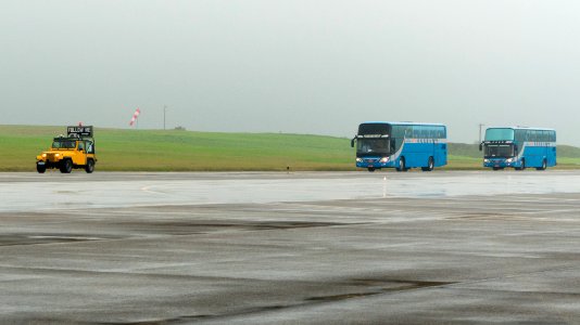 Follow-me Car Leading Shuttle Buses in Ching Chuang Kang Air Force Base Apron 20161126