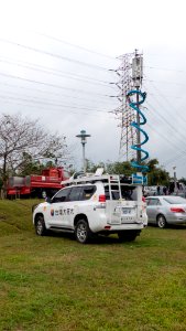 Mobile Phones Base Station Cars of Taiwan Mobile Parked at Nanhu Ricerside Park North 20150204