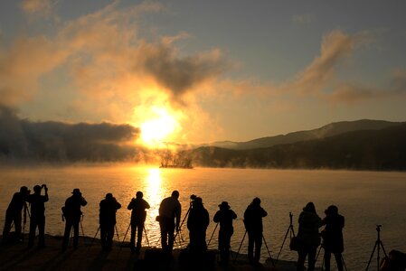 Dawn water mist people