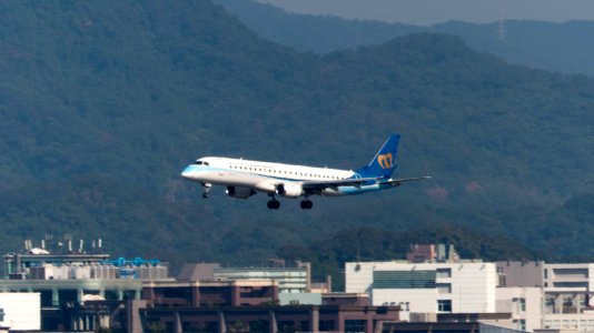 Mandarin Airlines Embraer 190 B-16822 on Final Approach at Taipei Songshan Airport 20150104a