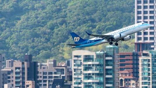 Mandarin Airlines Embraer 190 B-16828 Taking off from Taipei Songshan Airport 20140920b