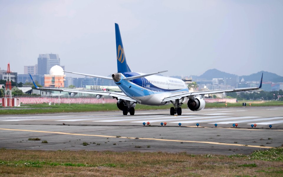 Mandarin Airlines Embraer ERJ 190 B-16825 Stand by at Taipei Songshan Airport Runway 20150101