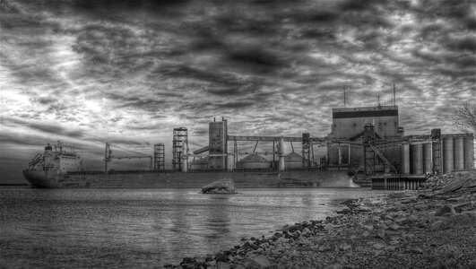 Black and white boat large ships