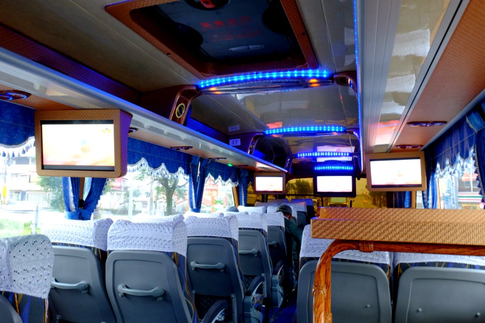 LCD Video Monitors at Interior of Shuttle Bus to Hongchailin Camp 20161224