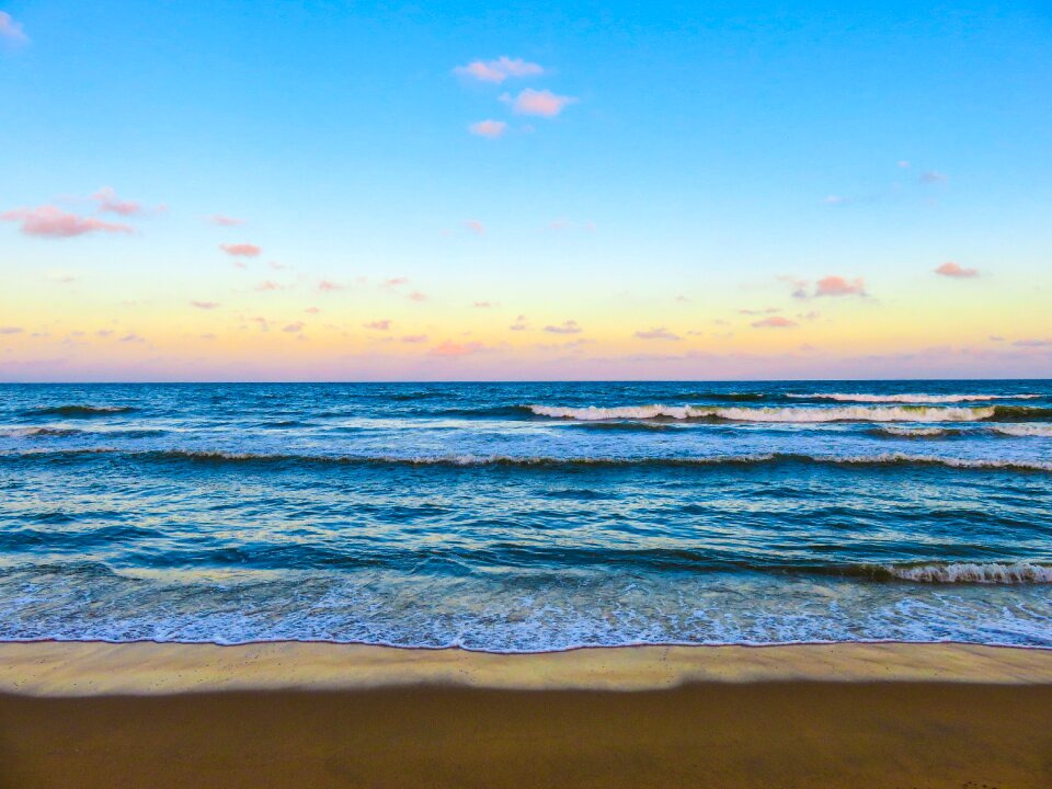 Sand shore waves photo