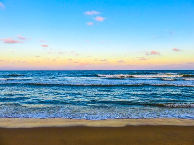 Sand shore waves photo