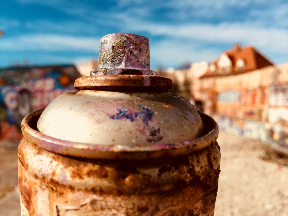Pollution street art tin can