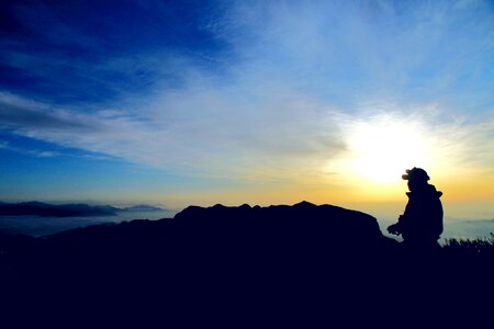 Four people with silhouette alpine