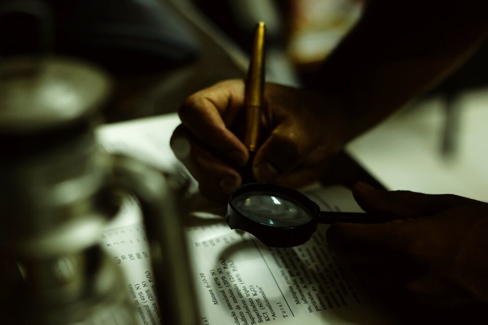 Magnifying glass pen business photo