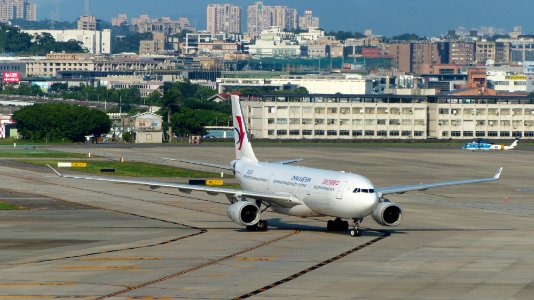 China Eastern Airlines Airbus A330-243 B-6128 Taxiing at Taipei Songshan Airport Apron 20160821a