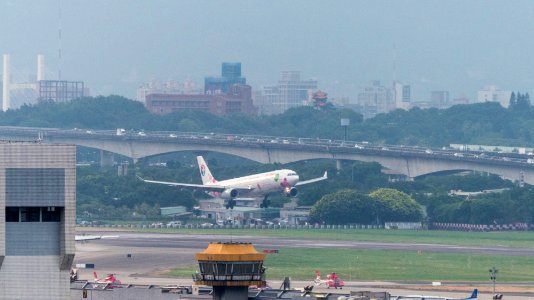 China Eastern Airlines Airbus A330-343 B-6129 Final Approach at Taipei Songshan Airport 20141008