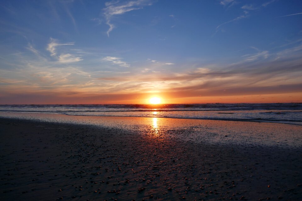 Sunset sea water clouds