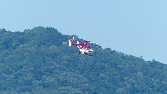 Daily Air BK-117B-2 B-55509 Taking off from Taipei Songshan Airport 20140930