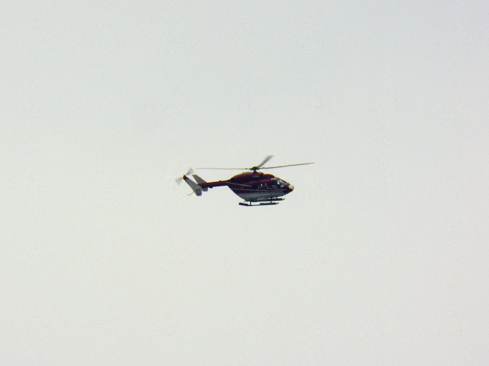 Daily Air BK-117B-2 Flying over Songshan District, Taipei 20121101