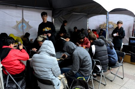 Adventurers Playing Hearthstone in Arena Tent 20170211c