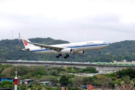 Air China Airbus A330-343 B-6523 on Final Approach at Taipei Songshan Airport 20150321a