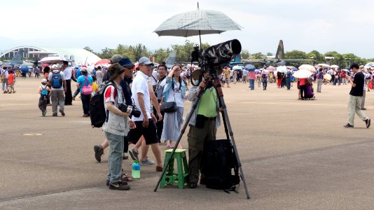 Aviation Photographer Photographing Airliner Taking off on Apron 20140719