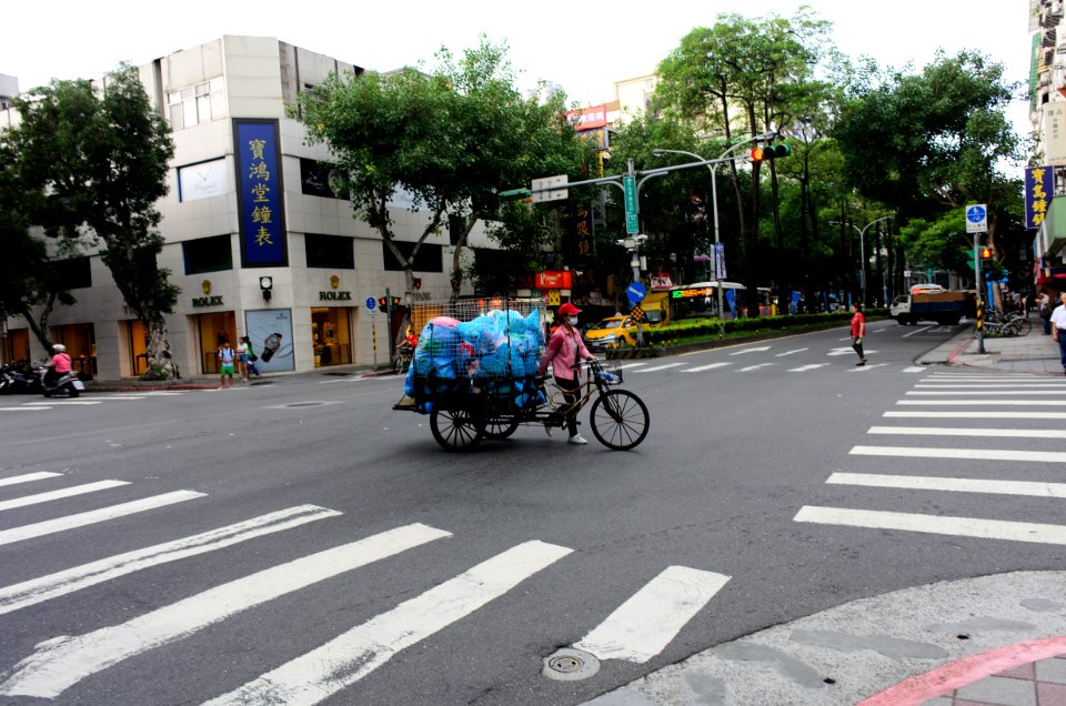 Women with Tricycle Crossing through Intersection of Xinzhong Street and Section 5, Minsheng East Road, Taipei 20150724