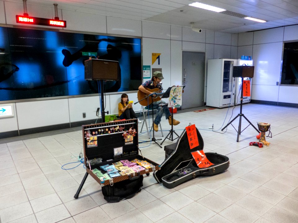 Young Man Playing Guitar in KMRT Kaohsiung Station Exit 1 20140811