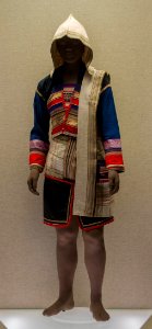 Women's outfit adorned with woven stripes and trimming photo
