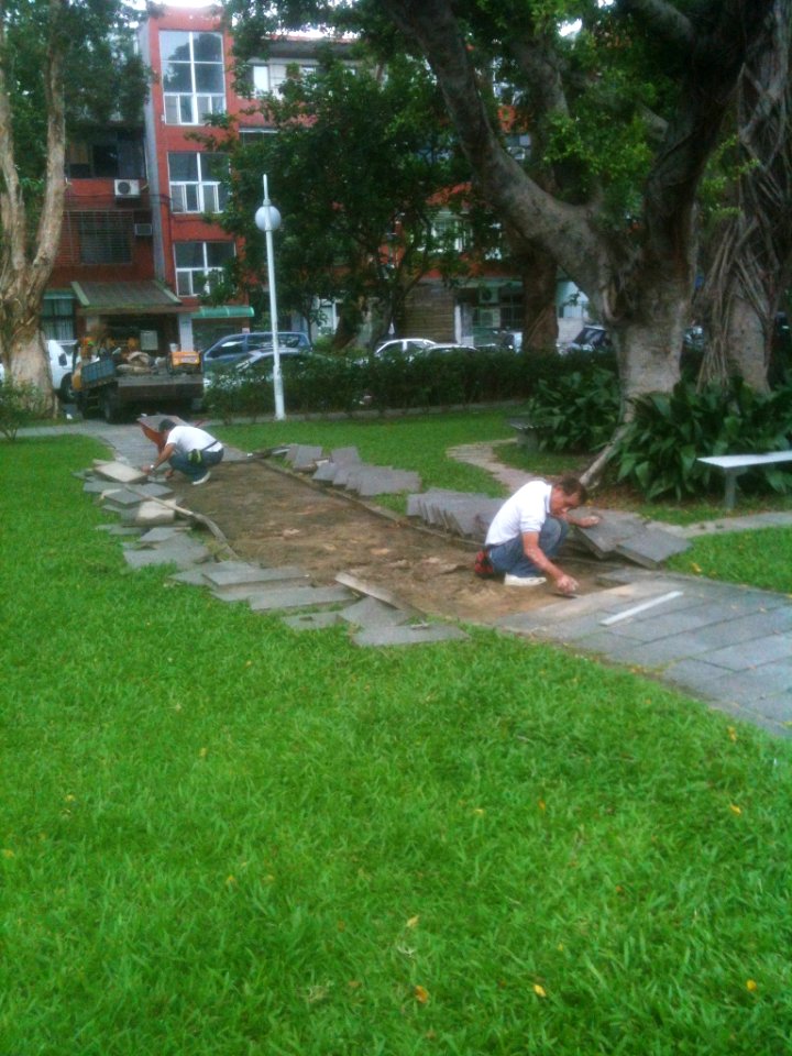 Workers Repaventing Walkway Stone Bricks in Minsheng Park 20151020