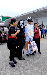 Two Television News Reporters Interviewing Admiral Cosplayer and Other One at FF25 20150131
