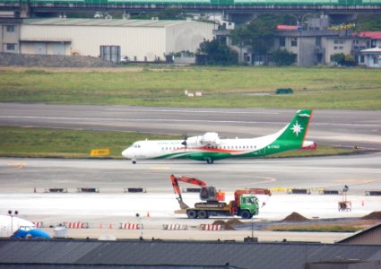 UNI Air ATR 72-600 B-17002 Taxiing at Taipei Songshan Airport 20130126b