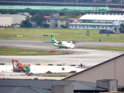 UNI Air ATR 72-600 B-17002 Taxiing at Taipei Songshan Airport 20130126a
