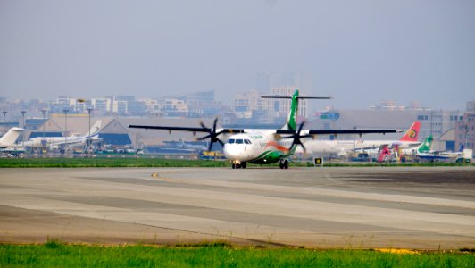 UNI Air ATR 72-600 B-17010 Departing from Taipei Songshan Airport 20150427a