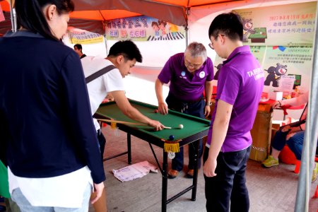 Visitors Playing Mini Billiards in DEPTC Booth 20170530