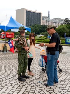 Visitor Talking with Soldier Holded Boy 20140607 photo
